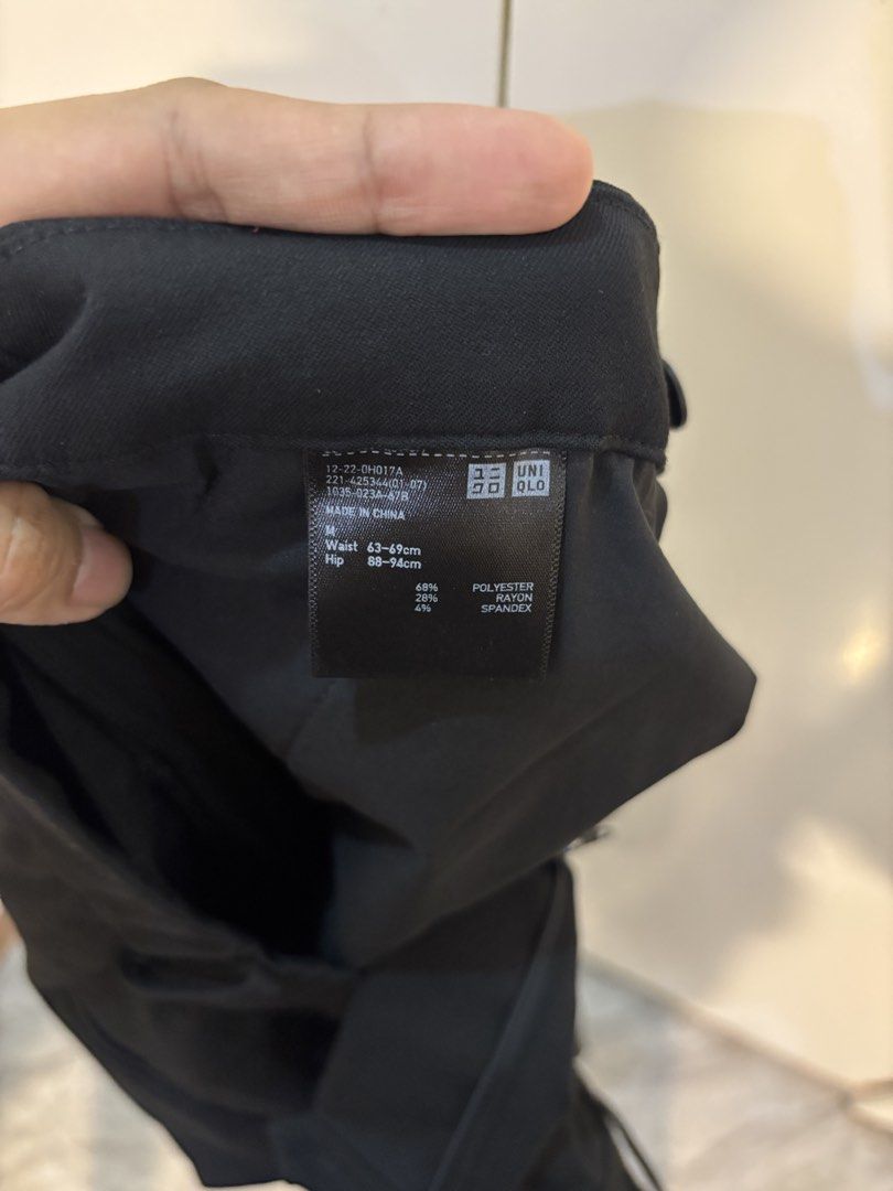 Uniqlo Black Smart Ankle Pants (Category: Other Bottoms) located in San Pedro. Submitted by rmbrn (Listing ID 1461713499, Image 2). Description: - Uniqlo Smart Ankle Pants - Color: Black - Size: Medium (Waist 63-69cm, Hip 88-94cm) - Material: Polyester & Spandex Blend - Features: Comfortable, versatile for work or casual wear - Styling: Effortlessly matches any top.