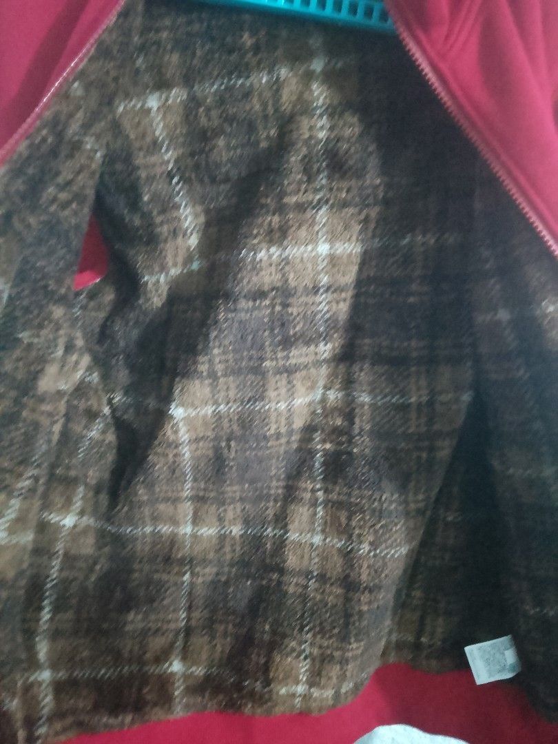 Uniqlo Fleeced Full Zip Jacket (Category: Coats, Jackets and Outerwear) located in General Trias. Submitted by reziahbant00650 (Listing ID 1461739266, Image 3). Description: - Uniqlo fleece full-zip hoodie - Color: Red - Size: L - Plaid-lined hood and interior - Zipper closure - Two pockets - Made in Vietnam - Original price tag attached.