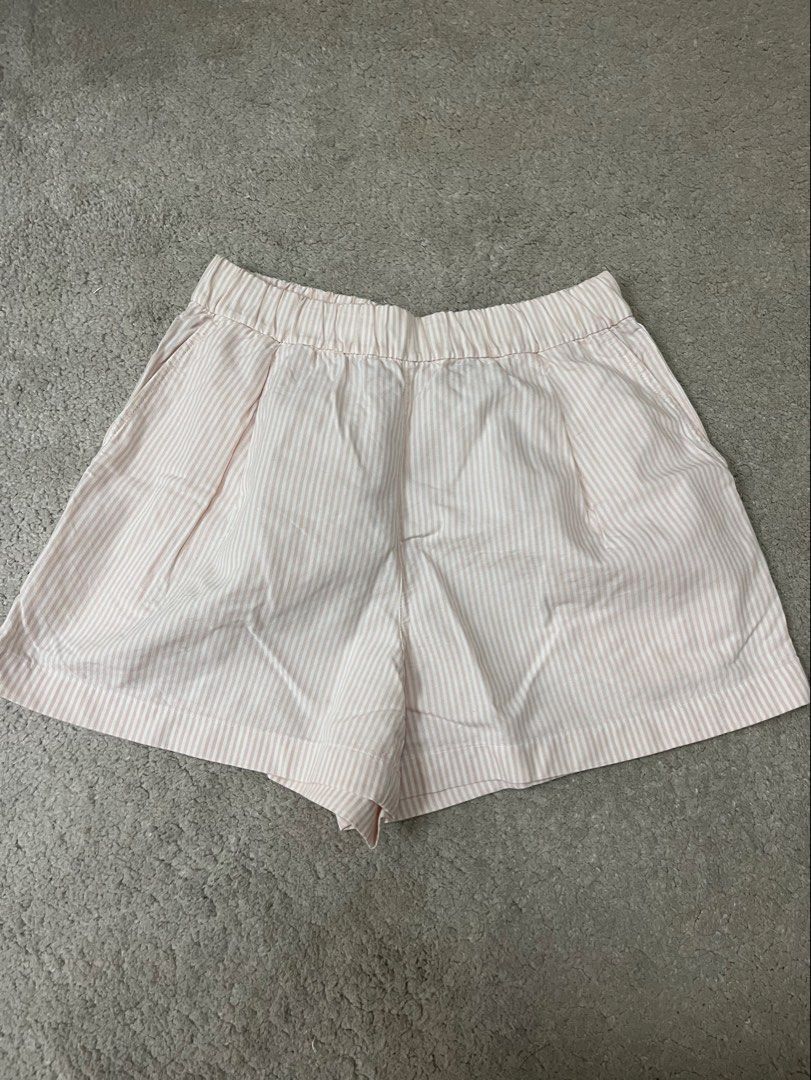 Uniqlo Pink Striped Shorts (Category: Shorts) located in Quezon City. Submitted by urfavecloset (Listing ID 1461675112, Image 2). Description: - baby pink striped shorts - adjustable - breathable - no flaws; perfect condition.
