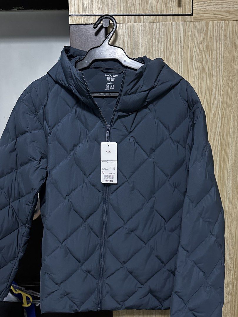 Uniqlo PUFFTECH Parka (Category: Coats, Jackets and Outerwear) located in Manila. Submitted by mcb001 (Listing ID 1461652415, Image 1). Description: Brand new, never worn with original tags * Brand: UNIQLO * Item: Women’s PUFFTECH Parka * Size: Large * Color: Navy * Condition: Brand new / never used * Original tag still attached * Water-repellent and lightweight * With hood RFS: Japan trip was cancelled, so the jacket is no longer needed. Loc: Qu