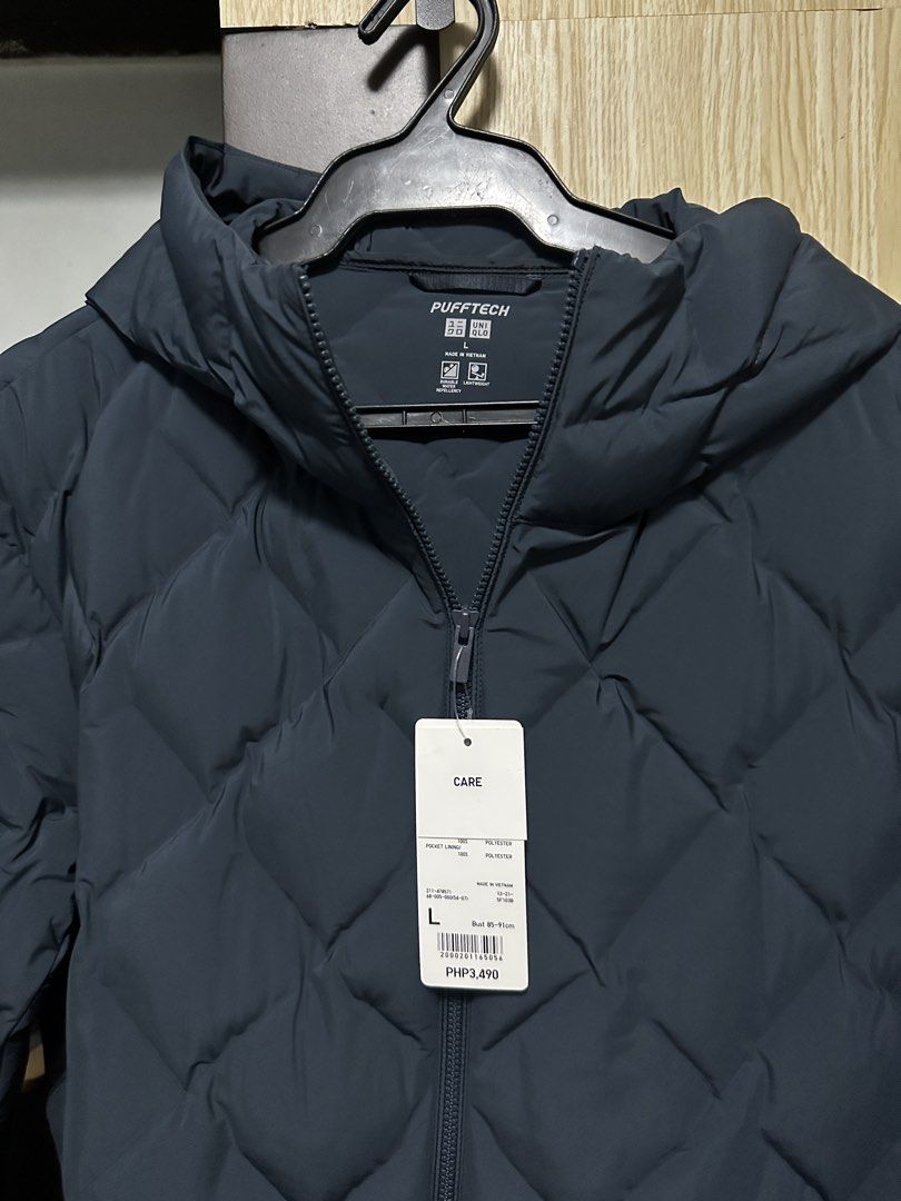 Uniqlo PUFFTECH Parka (Category: Coats, Jackets and Outerwear) located in Manila. Submitted by mcb001 (Listing ID 1461652415, Image 3). Description: Brand new, never worn with original tags * Brand: UNIQLO * Item: Women’s PUFFTECH Parka * Size: Large * Color: Navy * Condition: Brand new / never used * Original tag still attached * Water-repellent and lightweight * With hood RFS: Japan trip was cancelled, so the jacket is no longer needed. Loc: Qu