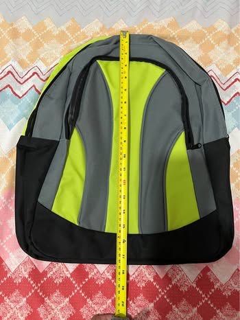 Unisex Backpack - Grey, Neon Green, Black (Category: Backpacks) located in Caloocan City. Submitted by allotherthings26 (Listing ID 1461637405, Image 3). Description: - Stylish grey, neon green, and black color combo - Spacious main compartment for all your essentials - Convenient front pocket for quick access items - Adjustable straps for a comfortable, customized fit - Ideal size for everyday use or school (approx. 18" H x 13" W).