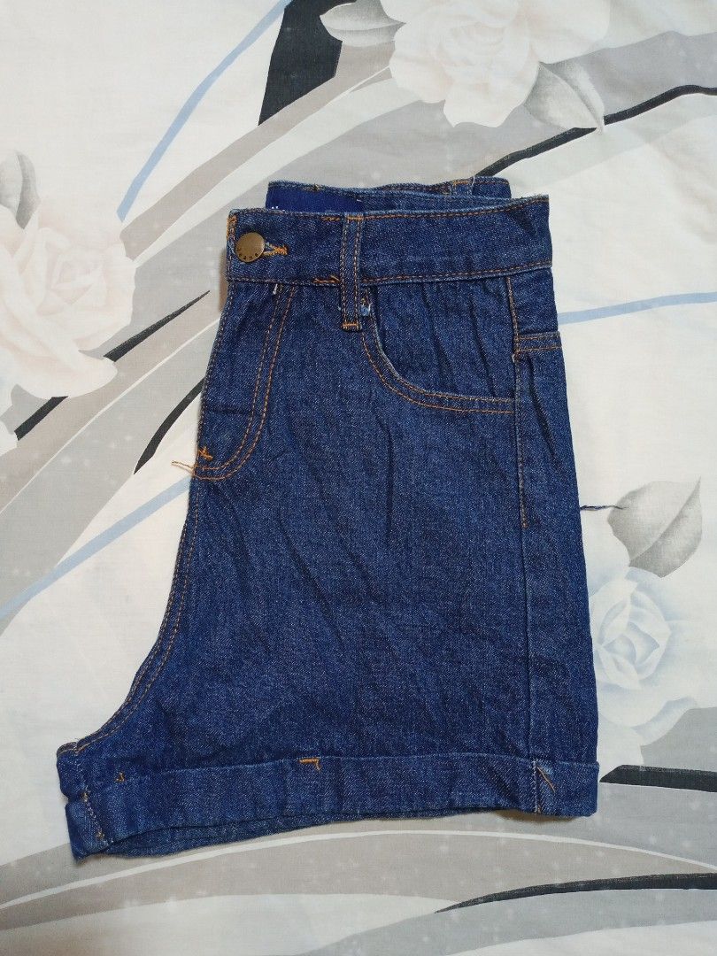 Unknown Dream Denim High-Waisted Shorts (Category: Shorts) located in Dumaguete. Submitted by morie_luna15 (Listing ID 1461562727, Image 3). Description: -Size: 24-25 - Brand: Unknown Dream - Style: Dark wash denim shorts - Fit: High-waisted - Closure: Button and zip - Details: Cuffed hems, classic five-pocket design - Occasion: Casual wear, versatile pairing with any top.