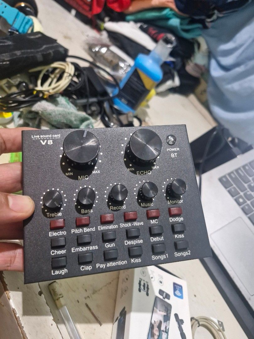 V8 Live Sound Card Audio Mixer (Category: Soundbars, Speakers & Amplifiers) located in Quezon City. Submitted by kizuke (Listing ID 1461723346, Image 1). Description: - V8 Live Sound Card - Controls: Mic, Echo, Music, Monitor - Sound Effects: Dodge, Kiss, Clap - Perfect for Live Streaming & Podcasting - Bluetooth Connectivity - Power & Bluetooth Indicators.
