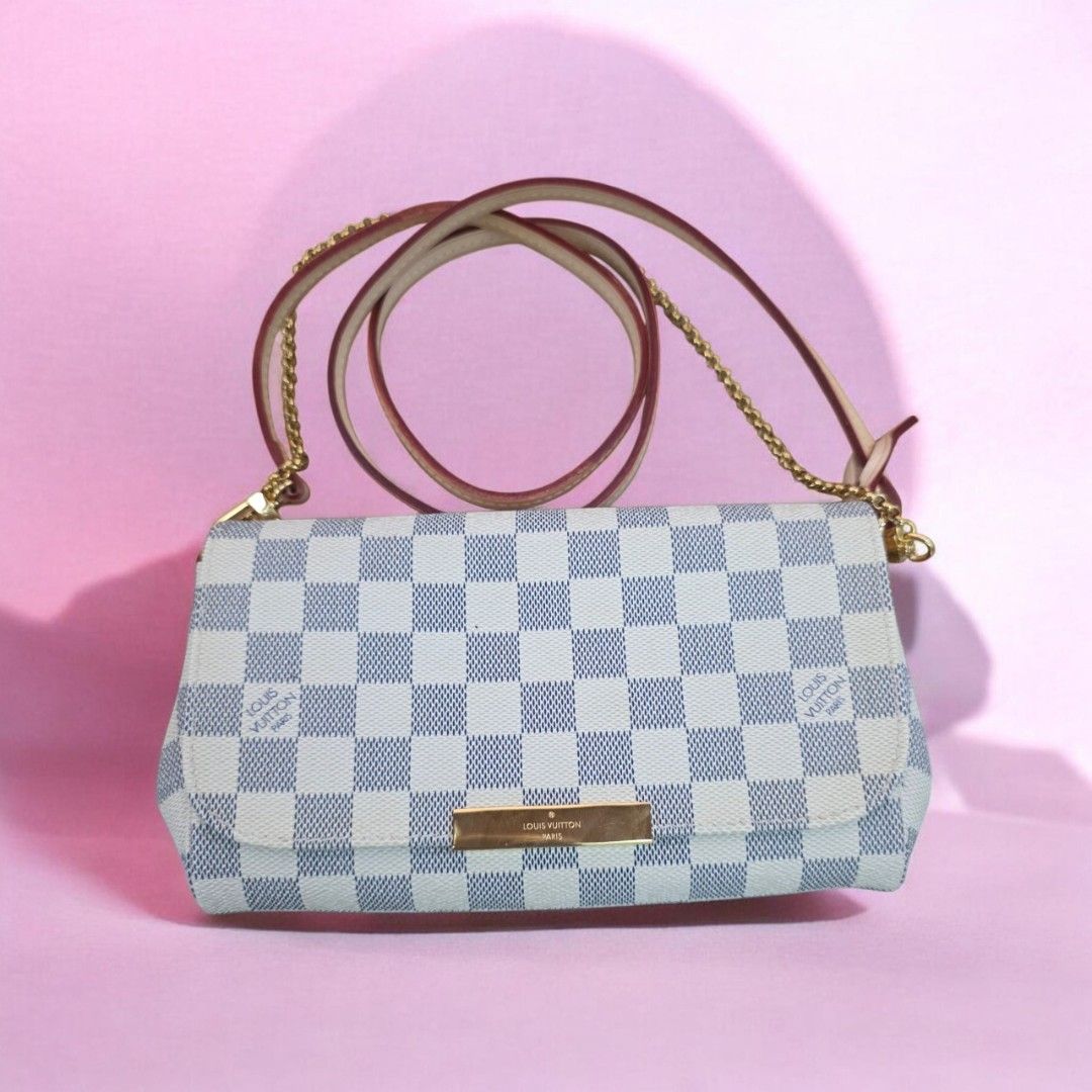 Ľv Favorite Damier Azur PM (Category: Cross-body Bags) located in Quezon City. Submitted by lifestyleboutik (Listing ID 1461760397, Image 1). Description: Ukay Source No fowl smell Dirtstain inside Coded PM Size.