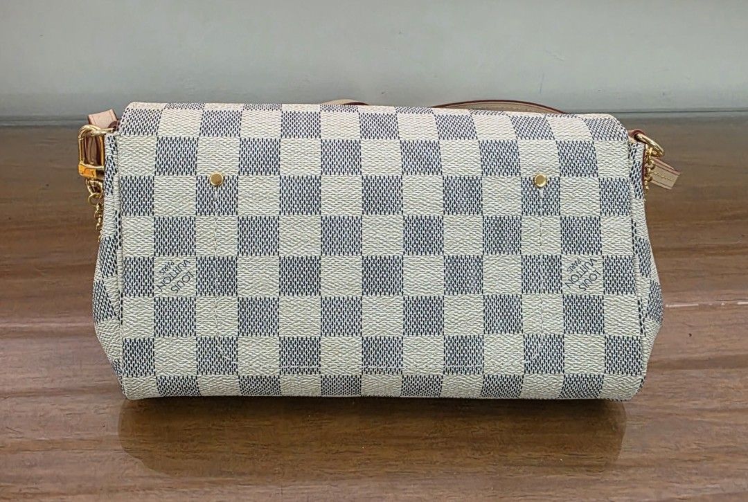 Ľv Favorite Damier Azur PM (Category: Cross-body Bags) located in Quezon City. Submitted by lifestyleboutik (Listing ID 1461760397, Image 2). Description: Ukay Source No fowl smell Dirtstain inside Coded PM Size.