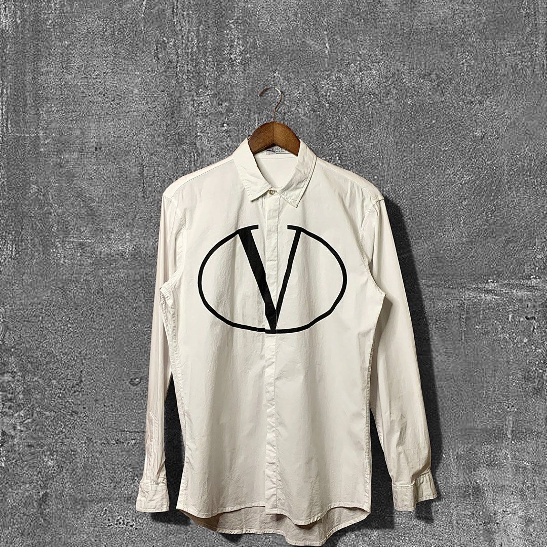 Valentino VLTN Button down (Category: Formal Shirts) located in Quezon City. Submitted by donklasiko (Listing ID 1461568312, Image 1). Description: Condition: 9.5+/10 Pristine condition Issue: non Refer to the dimension 🤗 PM FOR MORE DETAILS NO RETURN, NO EXCHANGE & NO REFUND! ✅I ALSO ACCEPT TRADE/SWAP TO ANYTHING JUST DROP YOUR OFFER Please manage your expectations, this is a secondhand item. What you see is what you get 😊 💵MOP: GCASH, BDO or