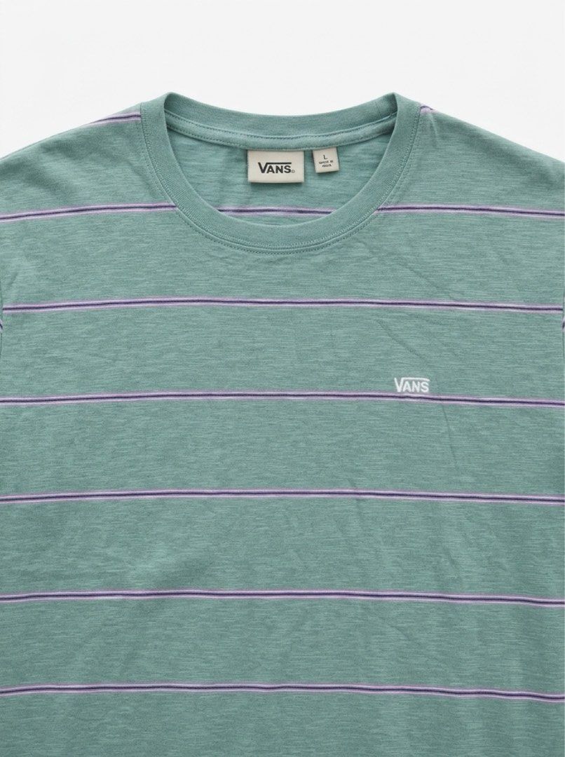 Vans Striped T-Shirt Size L (Category: Tshirts & Polo Shirts ) located in Makati City. Submitted by dymon_08 (Listing ID 1461720249, Image 2). Description: - Green Vans t-shirt - Purple and white stripes - Size L - Small mark on sleeve (circled in last photo).