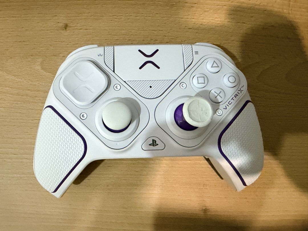 Victrix Pro BFG Wireless Modular Controller for PS5 PS4 (Category: Controllers) located in Kuala Lumpur. Submitted by stanz_xp2025 (Listing ID 1461686852, Image 2). Description: - Victrix Pro BFG Wireless Controller - Compatible with PS5 and PS4 - Stylish purple and white colorway - Comes with a protective carrying case - All original accessories included - Perfect for an enhanced gaming experience.