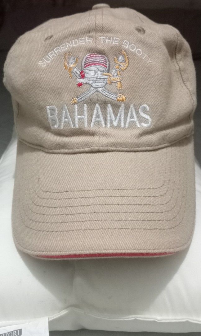 Vintage Bahamas Cap (Category: Caps & Hats) located in Tarlac. Submitted by faithfulfinds (Listing ID 1461721903, Image 1). Description: Vintage Bahamas "Surrender The Booty" Cap Condition: Like new, Malinis pa Brand: Dorsett Tee's (Authentic Bahamas Souvenir) Material: 100% Cotton Color: Khaki Magandang panlakad o pang-porma. Walang kupas o himulmol..