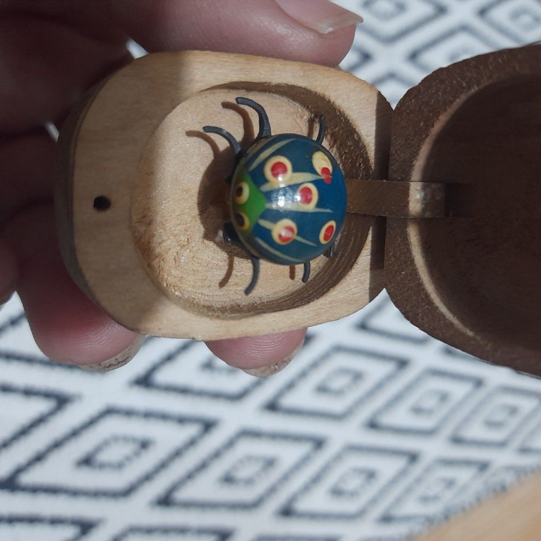 Vintage Beetle in a wooden case (Category: Vintage Collectibles) located in Bocaue. Submitted by marajapansurplus (Listing ID 1461700462, Image 2). Description: - Vintage beetle toy - Comes in a wooden case - Colorful and unique design - Suitable for ages 8 and up - selling as it is - it's legs are moving - Great collectible item.