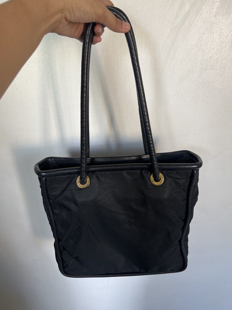 Celine Nylon Tote Bag with gold hardware (Category: Tote Bags) located in Las Pinas. Submitted by gaeley (Listing ID 1461579224, Image 2). Description: 💯 authentic no issue sa leather no bakbak only sign of usage fits A4 Sizes black.