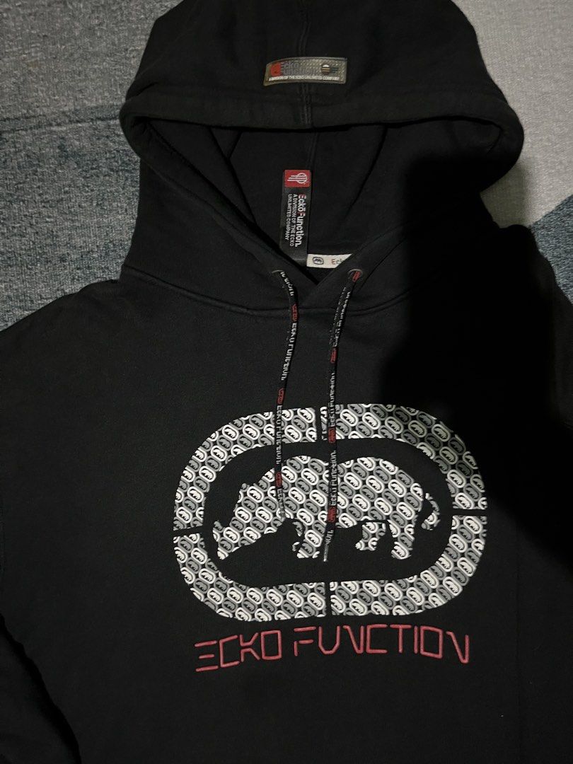 Vintage Ecko Function Black Hoodie Rhino Logo (Category: Coats, Jackets and Outerwear) located in Cabanatuan. Submitted by nik.ko (Listing ID 1461746631, Image 2). Description: Vintage Ecko Function black hoodie Size L on tag Lenght 28 Width 25 Sleeve 23 Color rate 9.5/10 Excellent condition Issues stitching see photos Nueva ecija Price 2500 + sf j&t.
