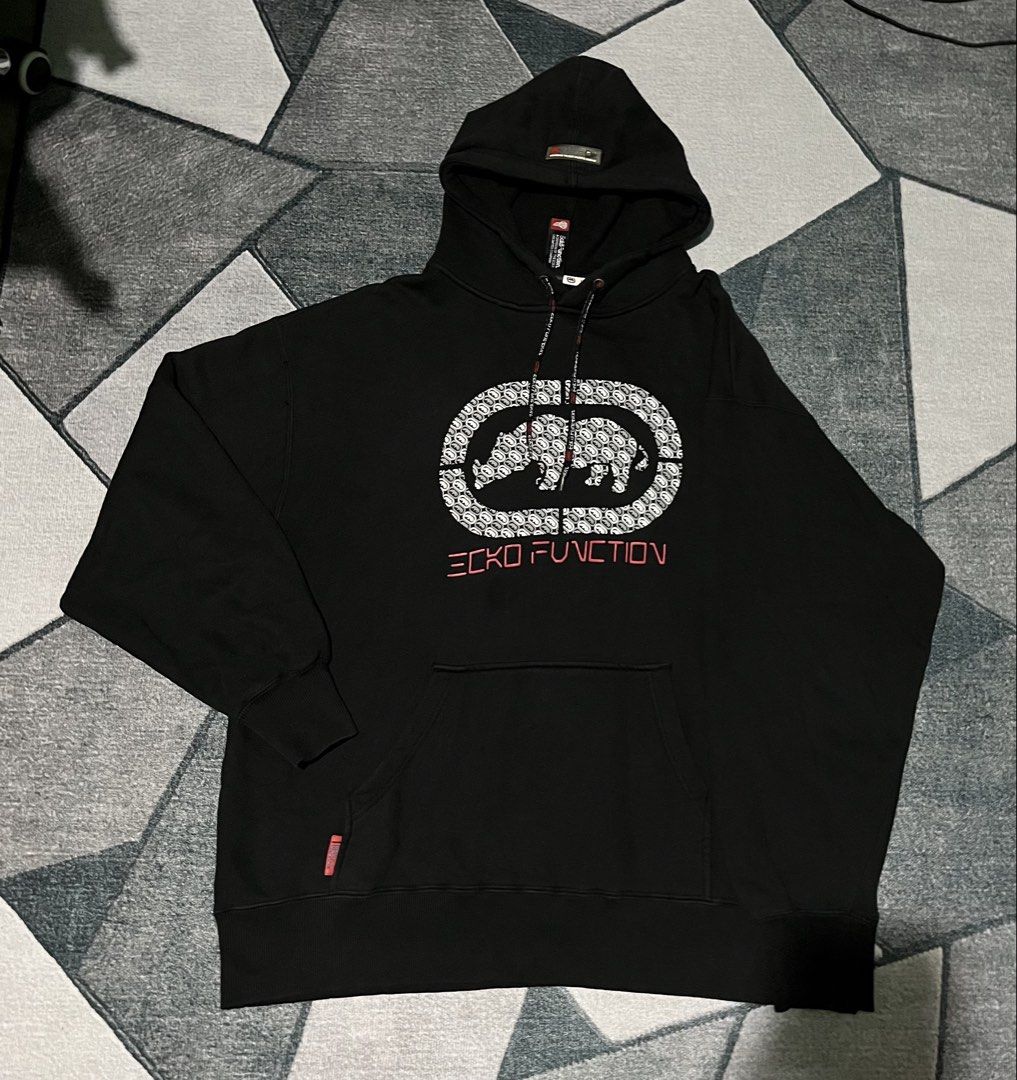 Vintage Ecko Function Black Hoodie Rhino Logo (Category: Coats, Jackets and Outerwear) located in Cabanatuan. Submitted by nik.ko (Listing ID 1461746631, Image 1). Description: Vintage Ecko Function black hoodie Size L on tag Lenght 28 Width 25 Sleeve 23 Color rate 9.5/10 Excellent condition Issues stitching see photos Nueva ecija Price 2500 + sf j&t.