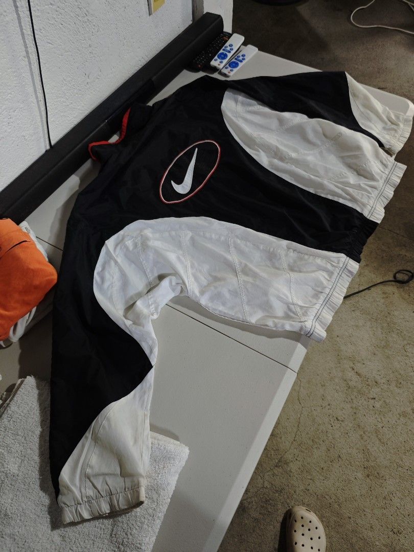 Vintage Nike Oval Windbreaker (Category: Coats, Jackets and Outerwear) located in Dagupan City. Submitted by johnny.flips (Listing ID 1461624879, Image 3). Description: 26W 27L loose ribbings need wash minimal small ran on ribbings.