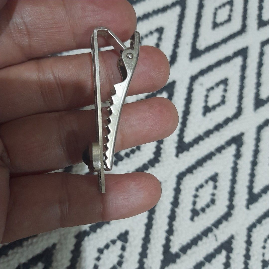 Vintage Tie Clip (Category: Ties) located in Bocaue. Submitted by marajapansurplus (Listing ID 1461687407, Image 2). Description: - Vintage tie clip - Features a small, dark stone - Classic and elegant design - Suitable for formal wear - selling as it is - Japan sourced item.