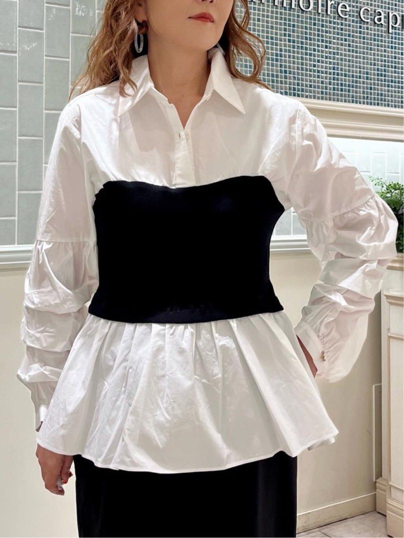 Vintage White Bustier Peplum Blouse (Category: Longsleeves) located in Binan City. Submitted by mypreloved_haul (Listing ID 1461714299, Image 2). Description: Fits xs to small This is a black-and-white layered 2-in-1 long-sleeve blouse featuring a fitted black corset-style bustier overlay with a center drawstring..