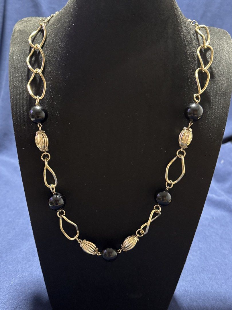 vintage-style gold-tone chain accessory (Category: Necklaces) located in Angeles City. Submitted by zyeplustradings (Listing ID 1461635754, Image 3). Description: vintage-style gold-tone chain accessory configured with open-link geometric sections alternating with smooth black spherical beads and textured, ribbed gold melon beads..