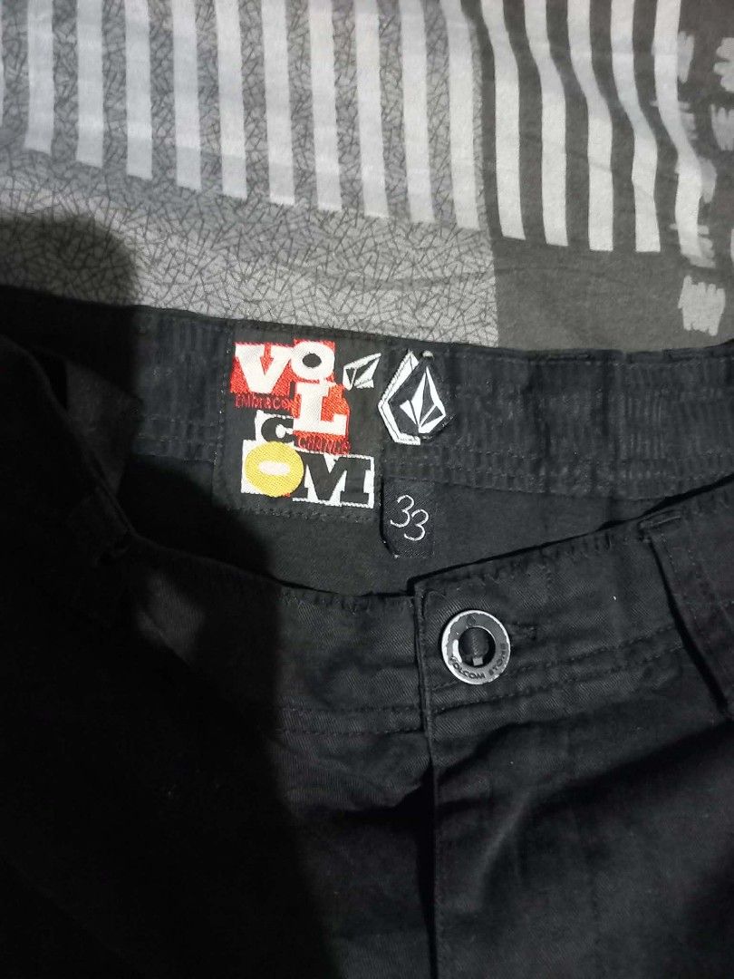 Volcom Black Shorts Size 33 (Category: Shorts) located in Panabo. Submitted by khimmyirish_ki021126 (Listing ID 1461679813, Image 1). Description: - Volcom black shorts - Size 33 - Classic, everyday style - Features Volcom logo on front and back - Button and zip closure - Two side pockets - Two back pockets - Versatile wardrobe staple.