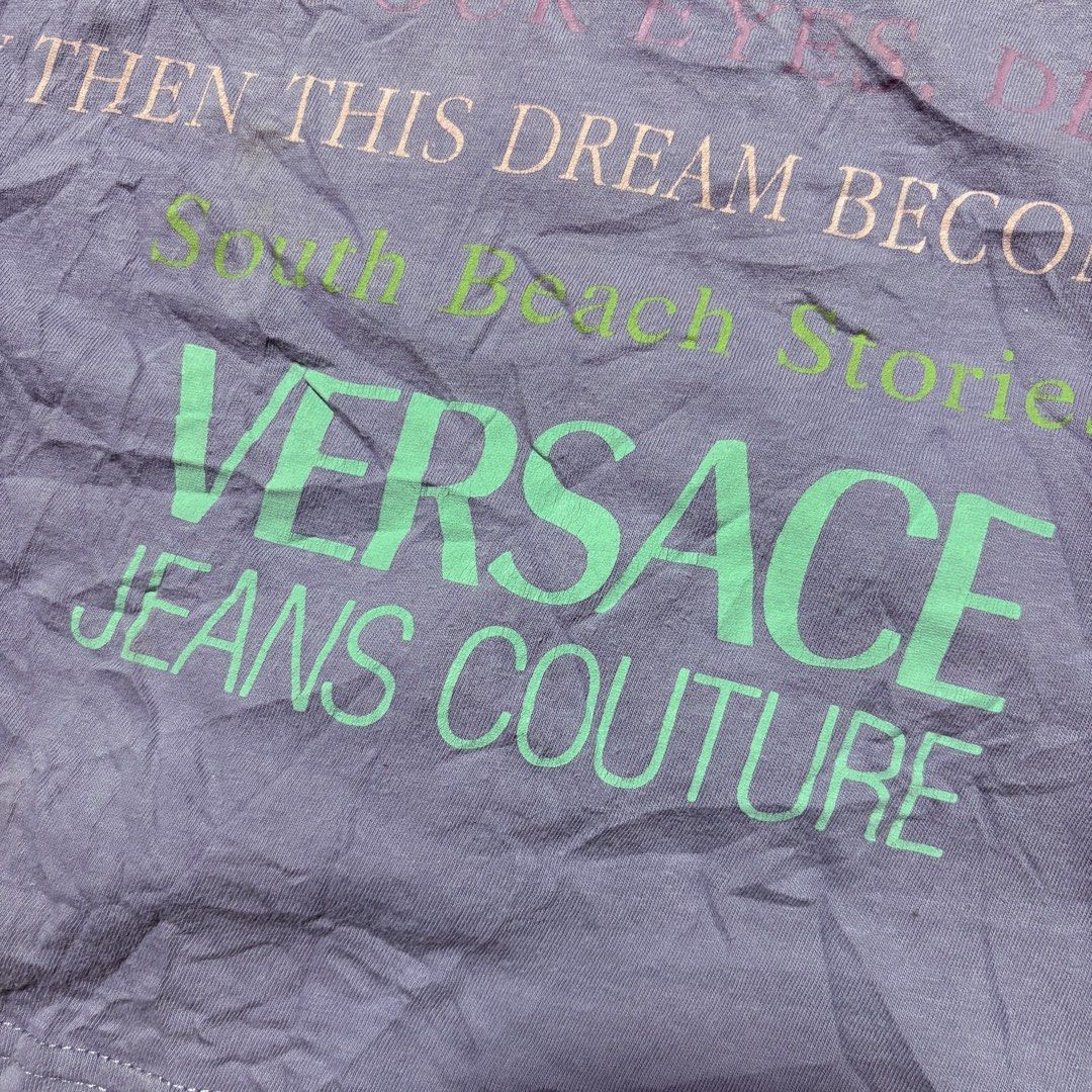 Vtg Versace Jeans Couture Tee (Category: Tshirts & Polo Shirts ) located in Zamboanga. Submitted by thriftyyali (Listing ID 1461693963, Image 2). Description: - Authentic purple Versace Jeans Couture graphic tee - Features iconic Medusa head logo and text print - Size: XS on tag (Medium to Large fitting) - Material: 100% Cotton - Perfect for casual wear - A unique addition to your wardrobe!.