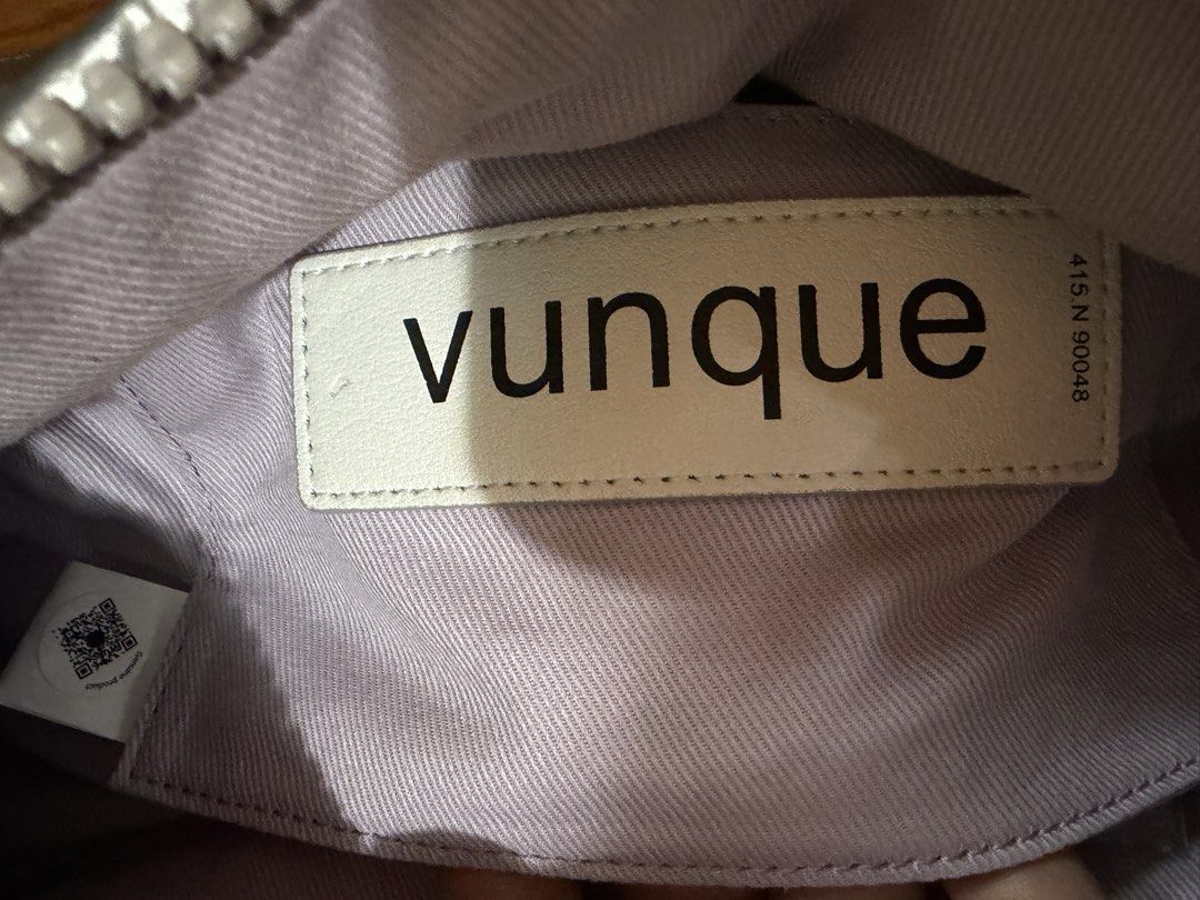 Vunque Silver Puffer Shoulder Bag (Category: Luxury Bags & Wallets) located in Tarlac. Submitted by jzennoroyy-32960 (Listing ID 1461601919, Image 3). Description: - Brand: Vunque - Color: Cool Silver - Style: Puffer Bag - Unique Feature: Razor blade detail on the front - Interior Color: Light Purple - Strap: Detachable - Features: Spacious interior, suitable for essentials - Versatile: Great for everyday use or a night out.