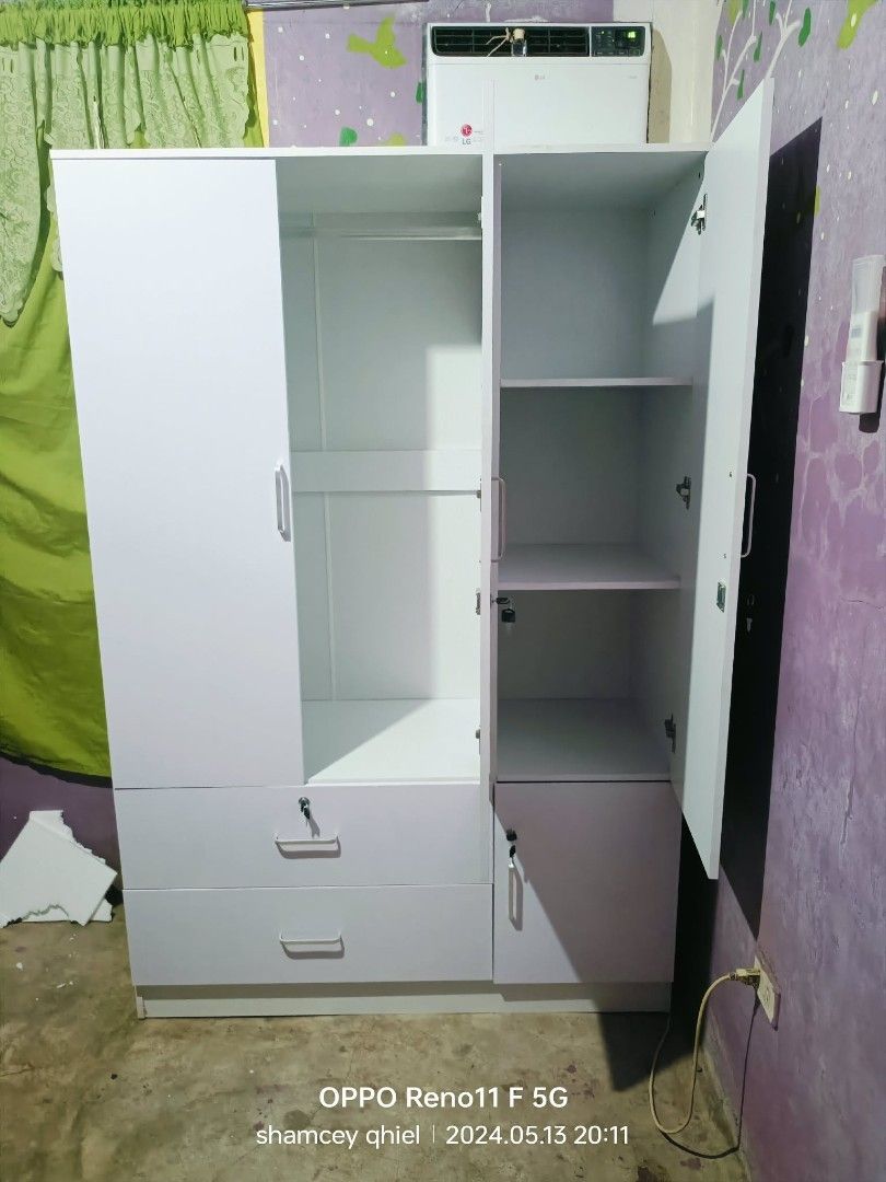 WHITE 3 DOORS CABINET (Category: Shelves, Cabinets & Racks) located in Manila. Submitted by maricel_10dorado (Listing ID 1461724403, Image 1). Description: Brand new item On hand stock Free assembly Ready to deliver Accept Bulk orders Cash on delivery Pm for past transaction 639649452374.