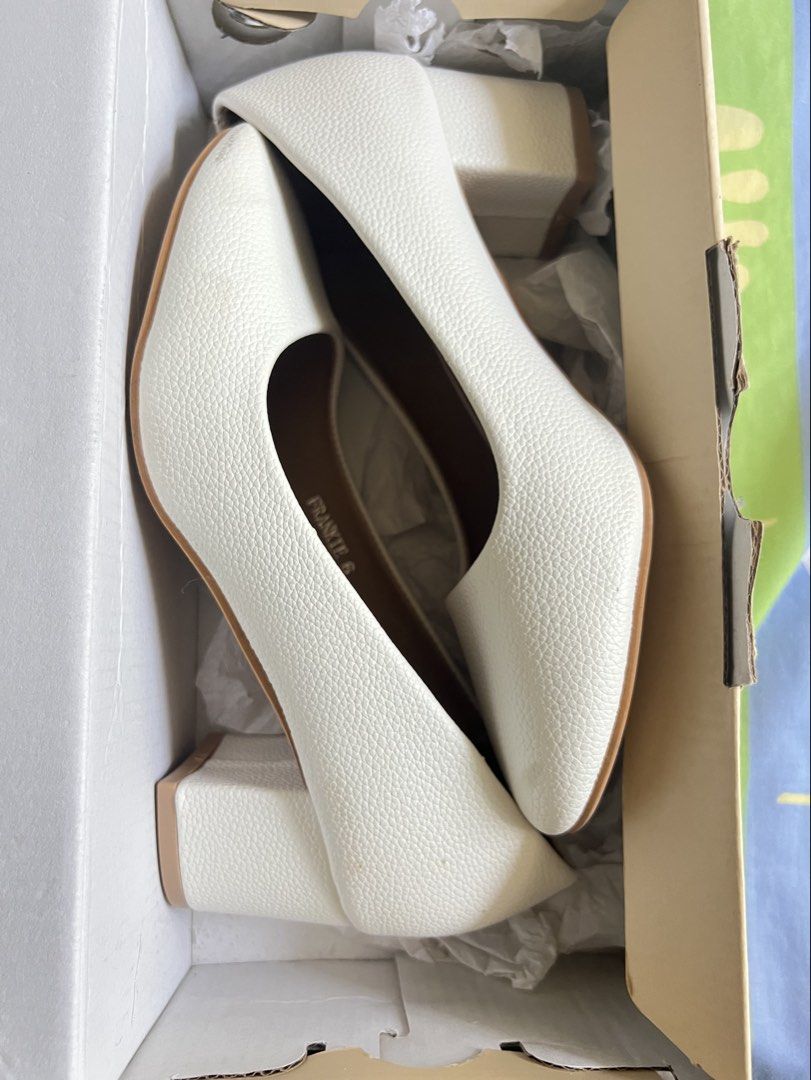 White Block Heels Pumps (Category: Heels) located in Manila. Submitted by mellnavarro_45618 (Listing ID 1461681214, Image 1). Description: - Stylish white block heels - Textured faux leather material - Classic closed-toe pump design - Comfortable and stable chunky heel - Ideal for work or special events - Includes original box.