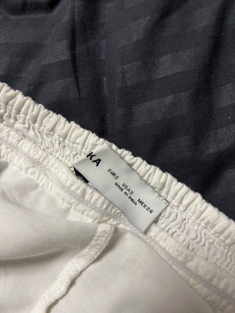 White Eyelet Tiered Mini Skirt (Category: Skirts) located in Paranaque City. Submitted by dubaichocolei (Listing ID 1461716861, Image 3). Description: - White tiered mini skirt - Eyelet details - Comfortable elastic waistband - Breezy and cute style - Ideal for summer or beach vibes - Versatile for pairing with different tops.