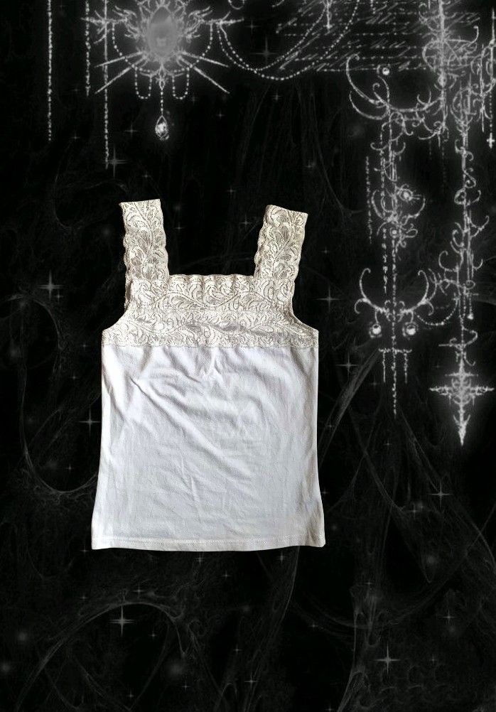 White Lace Tank Top (Category: Sleeveless) located in Tiaong. Submitted by cdoswan (Listing ID 1461569231, Image 1). Description: - Cute white tank top - Features delicate floral lace trim on straps and neckline - Soft and stretchy fabric for comfort - Versatile for layering or wearing on its own - Pairs well with jeans or skirts -XS to SMALL.