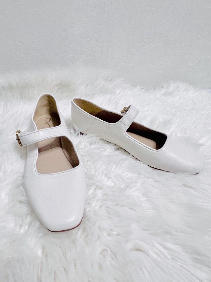 White Mary Jane Flats with Buckle Strap (Category: Flats & Sandals) located in Bacoor. Submitted by esorfashionboutique (Listing ID 1461563765, Image 2). Description: - Cute white Mary Jane flats - Features a strap with a small buckle closure - Stylish square toe design - Versatile for casual or dressy looks.