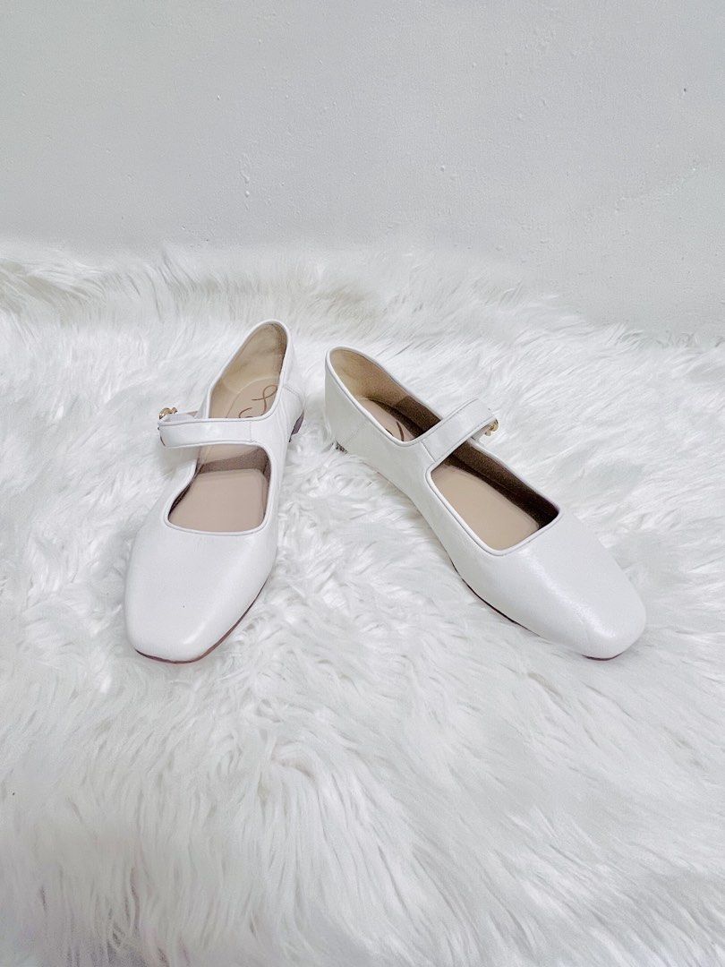 White Mary Jane Flats with Buckle Strap (Category: Flats & Sandals) located in Bacoor. Submitted by esorfashionboutique (Listing ID 1461563765, Image 1). Description: - Cute white Mary Jane flats - Features a strap with a small buckle closure - Stylish square toe design - Versatile for casual or dressy looks.