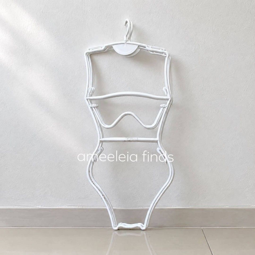 White Plastic Mannequin Body Frame Hanger for Clothes (Category: Hooks & Hangers) located in Muntinlupa City. Submitted by ameeliacloset (Listing ID 1461607170, Image 1). Description: - White plastic hanger shaped like a mannequin torso. - Ideal for displaying dresses, tops, or lingerie. - Helps garments maintain their shape. - Features a hook at the top for easy hanging. - Useful for closet organization and retail display. Loc Muntinlupa City ✨P