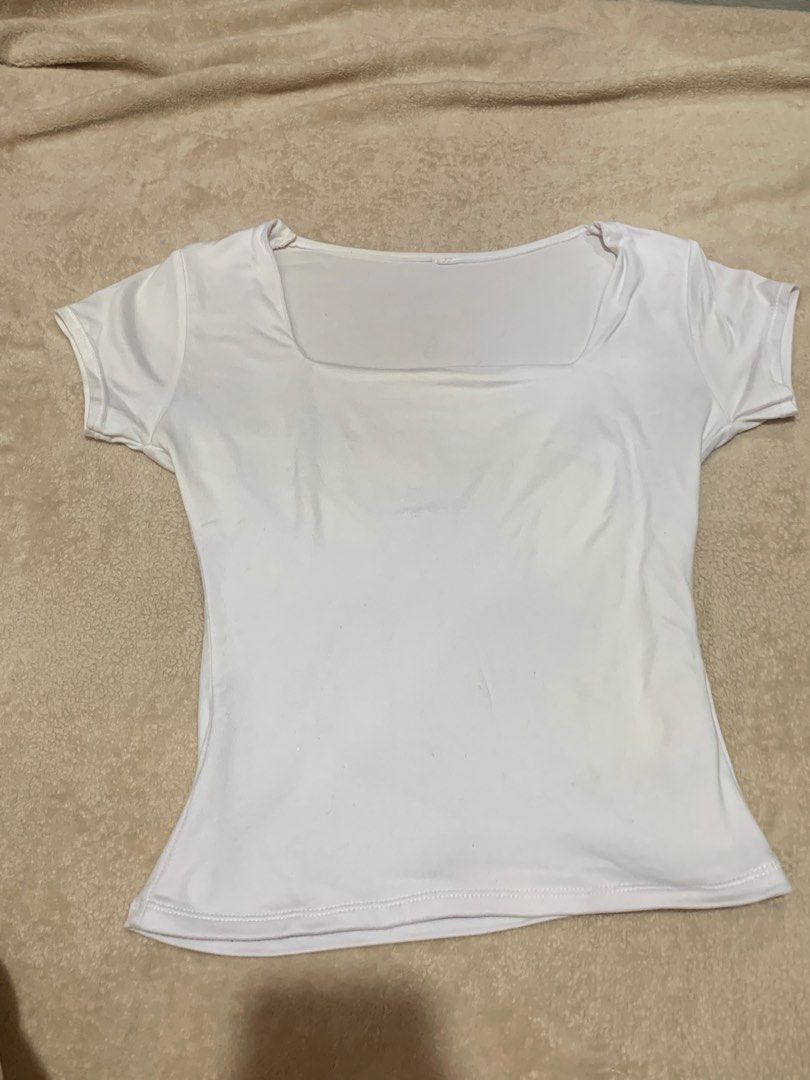White Square Neck T-shirt (Category: Shirts) located in Davao. Submitted by la__laura (Listing ID 1461773136, Image 1). Description: - Classic white t-shirt - Flattering square neckline - Short sleeves - Stretchy, body-hugging fit - Versatile for layering or wearing alone.
