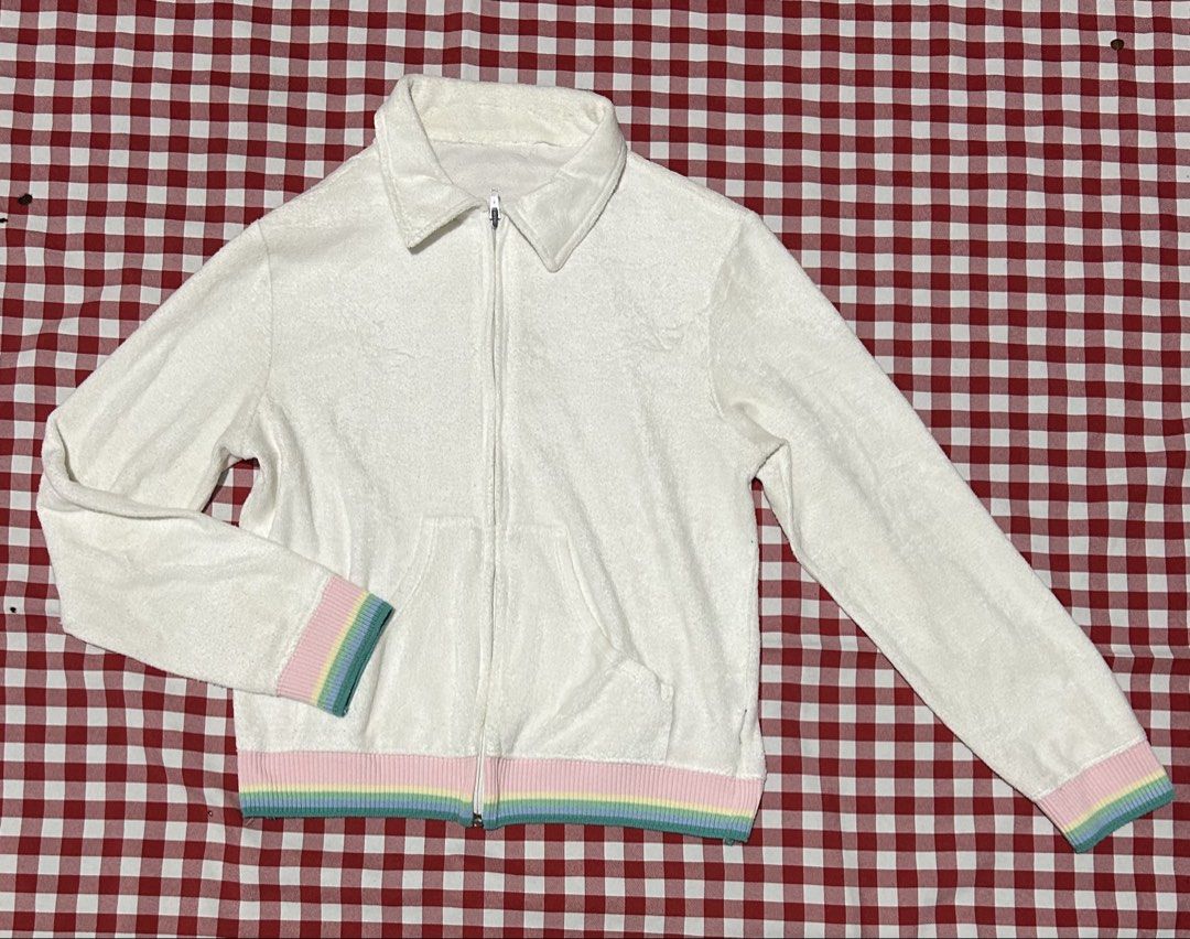 White Terry Zip-Up Jacket with Rainbow Trim (Category: Coats, Jackets and Outerwear) located in Plaridel. Submitted by ilovebubu28 (Listing ID 1461631480, Image 1). Description: - White terry cloth zip-up jacket - Features a collar and pockets - Rainbow striped trim on cuffs and hem - Soft and comfy material - Ideal for lounging or casual wear - Easy to zip up.