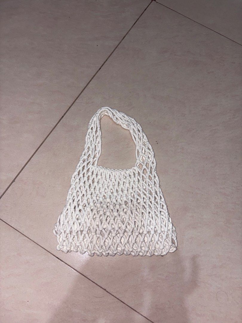 White Woven Beach Bag (Category: Tote Bags) located in Manila. Submitted by urpradabae (Listing ID 1461698764, Image 2). Description: Never been used!!! Bought it for a beach trip pero ‘di umabot lol.