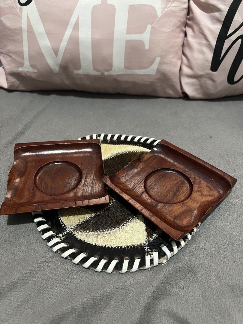 Wooden Coasters with Decorative Base (Category: Dinnerware & Cutlery) located in Las Pinas. Submitted by maple0305 (Listing ID 1461646864, Image 2). Description: - Set of 2 wooden coasters - Features circular indentations for cups - Comes with a unique decorative base (animal hide & woven material) - Adds a rustic touch to your table - Protects surfaces from drink stains.