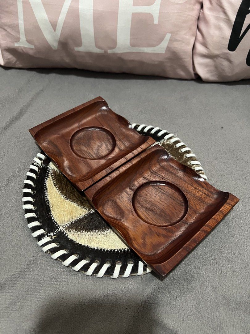 Wooden Coasters with Decorative Base (Category: Dinnerware & Cutlery) located in Las Pinas. Submitted by maple0305 (Listing ID 1461646864, Image 1). Description: - Set of 2 wooden coasters - Features circular indentations for cups - Comes with a unique decorative base (animal hide & woven material) - Adds a rustic touch to your table - Protects surfaces from drink stains.