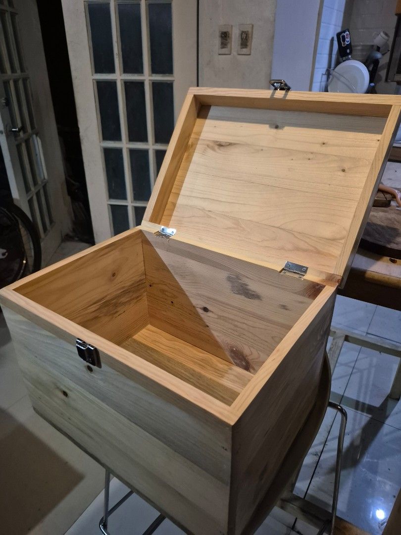Wooden storage box (Category: Wine Cellar & Storage) located in Manila. Submitted by maricrafts.trading (Listing ID 1461646578, Image 1). Description: 📦 Wooden Storage Box Price List • 14 × 10 × 10 inches — ₱850 • 16 × 12 × 12 inches — ₱1,350 • 18 × 16 × 16 inches — ₱1,950 • 20 × 20 × 20 inches — ₱2,850 Made to order Included: • Solid 0.5" pinewood panels • Metal hinges & latch • Smooth sanded finish • Protective top coat Customization Available