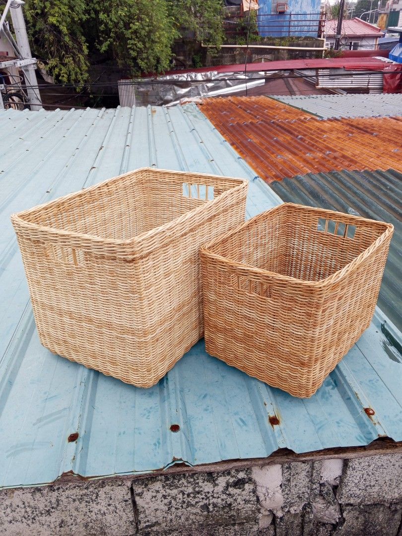 Woven Storage Baskets Set of 2 (Category: Storage Boxes & Baskets) located in Manila. Submitted by carl-raya_artisan.ph8925 (Listing ID 1461591870, Image 2). Description: - Set of 2 woven baskets: 2round, 2rectangular. - Features handles for easy carrying. - Ideal for organizing laundry, toys, blankets, and more. - Made from natural woven material. - Versatile for use in any room of your home. Rectangle: XL: size: length:21" Width:15" Height:15" 
