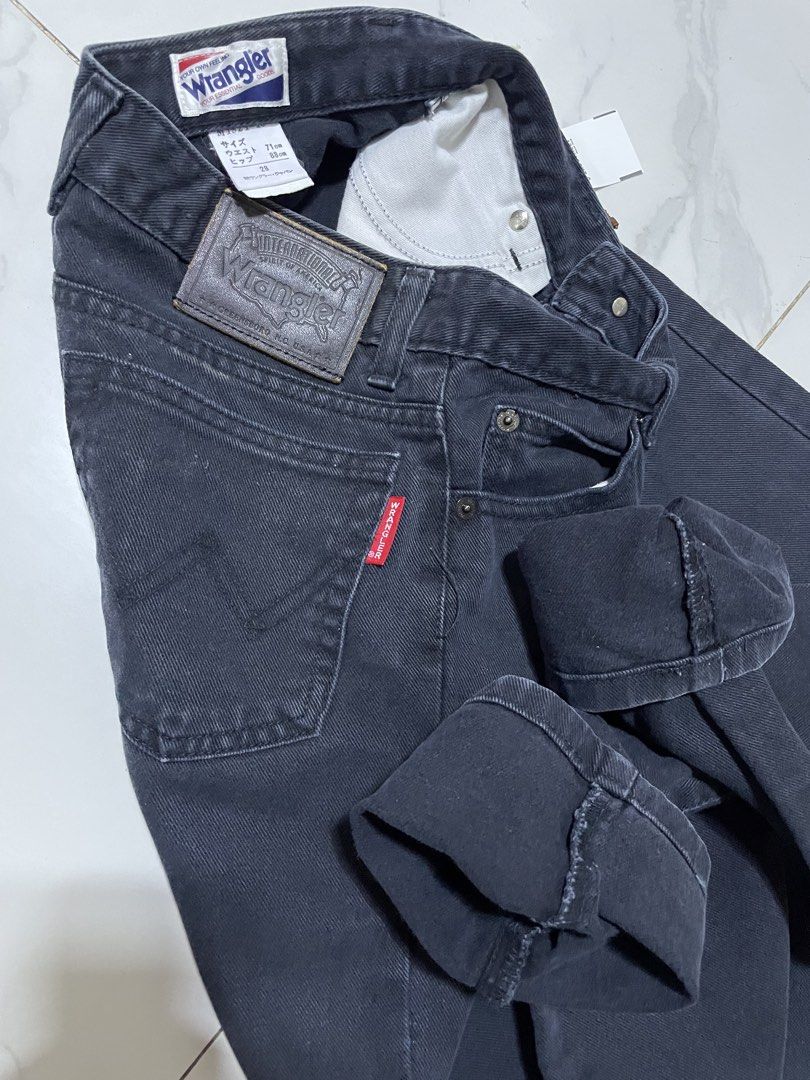 Wrangler Black Denim Jeans (Category: Jeans) located in General Santos City (Dadiangas). Submitted by angelahlim122001 (Listing ID 1461675470, Image 2). Description: - Classic black denim jeans Wrangler Denim Waist 27-28 Length 40 Hips 17 Thigh 9.5 Leg Hole 6 - Fit: Straight leg - Closure: Button and zip - Features: Two back pockets with signature stitching, leather patch on back waistband - Style: Versatile staple, easy to dress up or down.