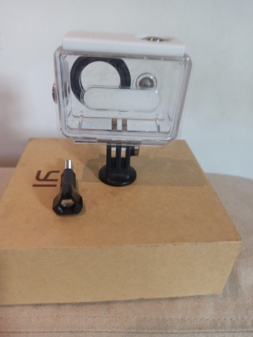 Xiaomi YI Action Camera Waterproof Case with Accessories (Category: Cameras) located in Caloocan City. Submitted by rtarellano (Listing ID 1461660361, Image 3). Description: - Waterproof case for Xiaomi YI Discovery and YI Lite action cameras. - IP68 rated for superior protection. - Includes mounting screw and base mount. - Ideal for underwater photography and dusty environments. - Keep your camera safe and ready for any adventure..