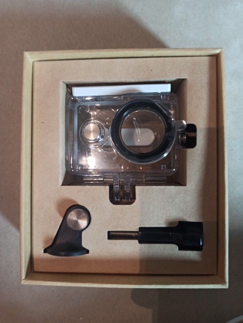 Xiaomi YI Action Camera Waterproof Case with Accessories (Category: Cameras) located in Caloocan City. Submitted by rtarellano (Listing ID 1461660361, Image 1). Description: - Waterproof case for Xiaomi YI Discovery and YI Lite action cameras. - IP68 rated for superior protection. - Includes mounting screw and base mount. - Ideal for underwater photography and dusty environments. - Keep your camera safe and ready for any adventure..