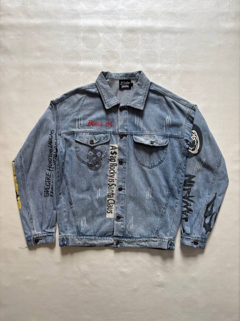 Y2K Grunge Graffiti Distressed Denim Trucker Jacket (Category: Coats, Jackets and Outerwear) located in Tacurong. Submitted by ukayutopia (Listing ID 1461631062, Image 1). Description: Y2K Grunge Graffiti Distressed Denim Trucker Jacket ‎ ‎Dimes: W24.5×L27 ‎Condition: Excellent ‎Color rate: 9/10 ‎Size on tag: Large ‎Issue: None.