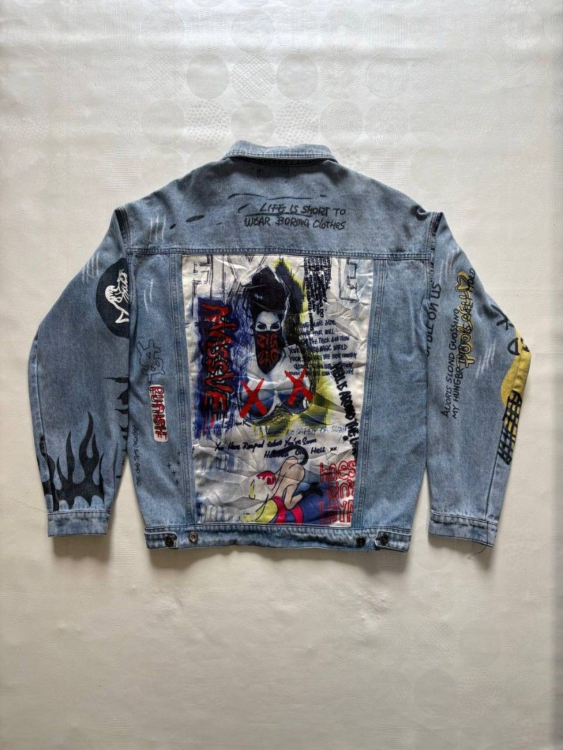 Y2K Grunge Graffiti Distressed Denim Trucker Jacket (Category: Coats, Jackets and Outerwear) located in Tacurong. Submitted by ukayutopia (Listing ID 1461631062, Image 3). Description: Y2K Grunge Graffiti Distressed Denim Trucker Jacket ‎ ‎Dimes: W24.5×L27 ‎Condition: Excellent ‎Color rate: 9/10 ‎Size on tag: Large ‎Issue: None.