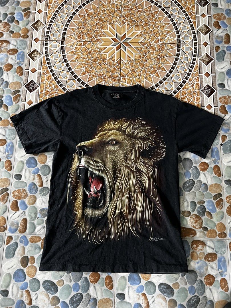 Y2k lion graphic tee (Category: Tshirts & Polo Shirts ) located in Manticao. Submitted by flipwithdave (Listing ID 1461797131, Image 1). Description: Y2k Lion graphic tee🔥 GOOD CONDITION✅ COLOR 9/10✅ WITH TAGS ✅ Dimes: L27 W19 PRICE:📩 PM na mga bossing📍‼️ IG: flip_with_dave FB: Flip With Dave Carousell: Flip with dave LOCATION: MINDANAO MOP: GCASH 📲 COURIER: J&T🚚 Pay first before delivery 📱 Strictly no cancelation ‼️ No refunds/ returns of 