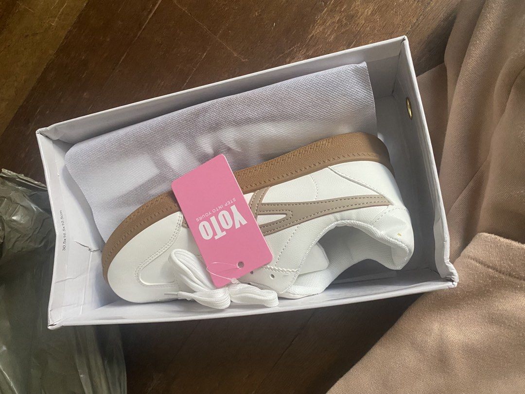 YOTO White & Tan Sneakers (Category: Sneakers) located in Manila. Submitted by kaayy.744 (Listing ID 1461649749, Image 1). Description: - Brand new YOTO sneakers - Color: White with tan accents - Includes original box and packaging - Classic low-top design - Features a gum sole - Ideal for casual wear.