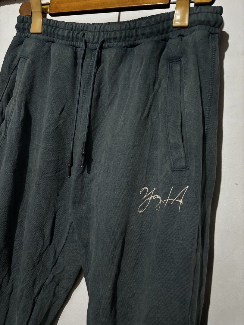 Young LA Joggers Pants (Category: Joggers) located in Subic. Submitted by thriftpoison (Listing ID 1461562390, Image 2). Description: - 'Young LA' logo on the front - Small back pocket with logo - Printed text on lower leg - Elastic waistband with drawstring - Ribbed cuffs - Large - Waist 32-36 Length 38.