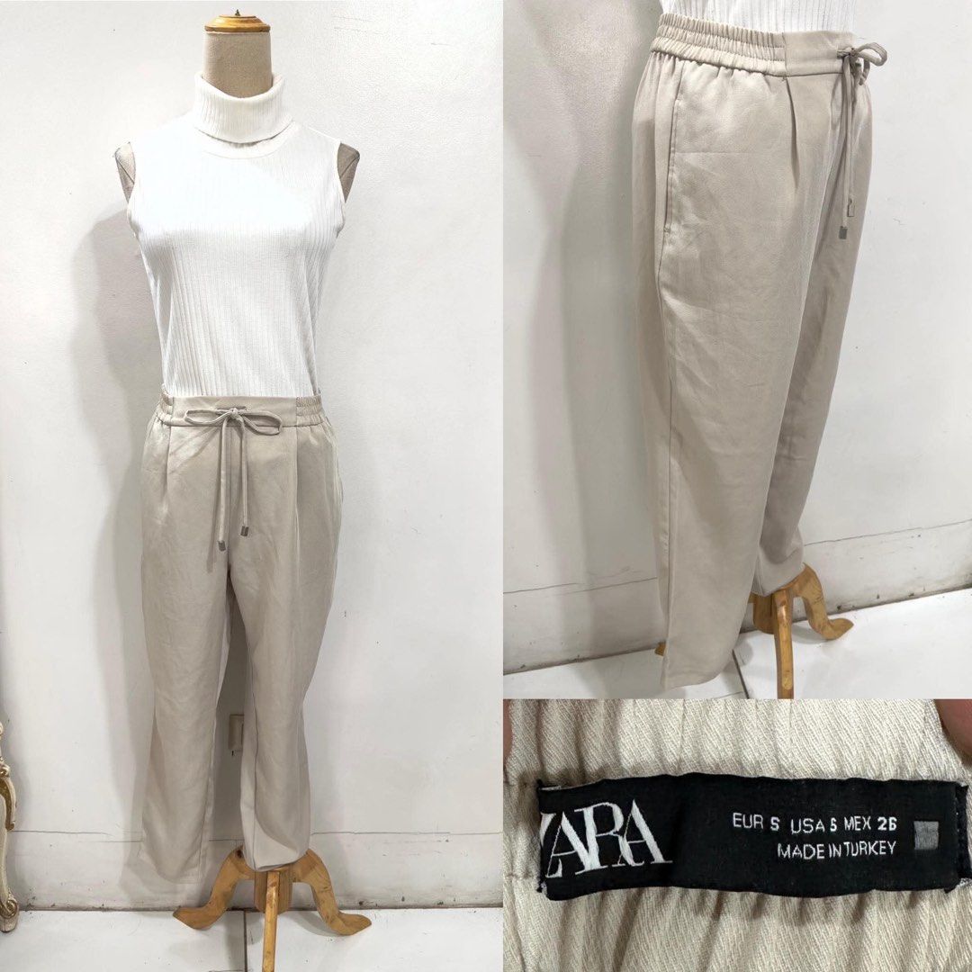 ZARA Beige Linen Blend Drawstring Waist Pants (Category: Other Bottoms) located in Bacolod City. Submitted by bhabissagal-05763 (Listing ID 1461609494, Image 1). Description: - Brand: ZARA - Color: Light Beige - Material: Linen Blend - Features: Elasticated waistband with drawstring, straight leg, side pockets - Occasion: Casual wear - Origin: Made in Turkey.