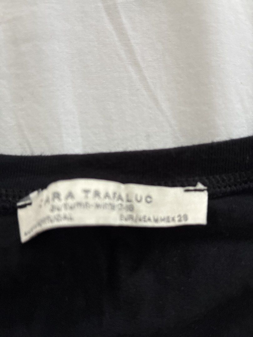 Zara Black Twist Front Long Sleeve Top (Category: Longsleeves) located in Pasig City. Submitted by slr1949 (Listing ID 1461600610, Image 3). Description: - Zara black long sleeve top -Fits small -Tiwst tie front - Features a stylish twist detail at the front hem - Comfortable and versatile for everyday wear - Easy to pair with jeans or skirts - Great for layering.