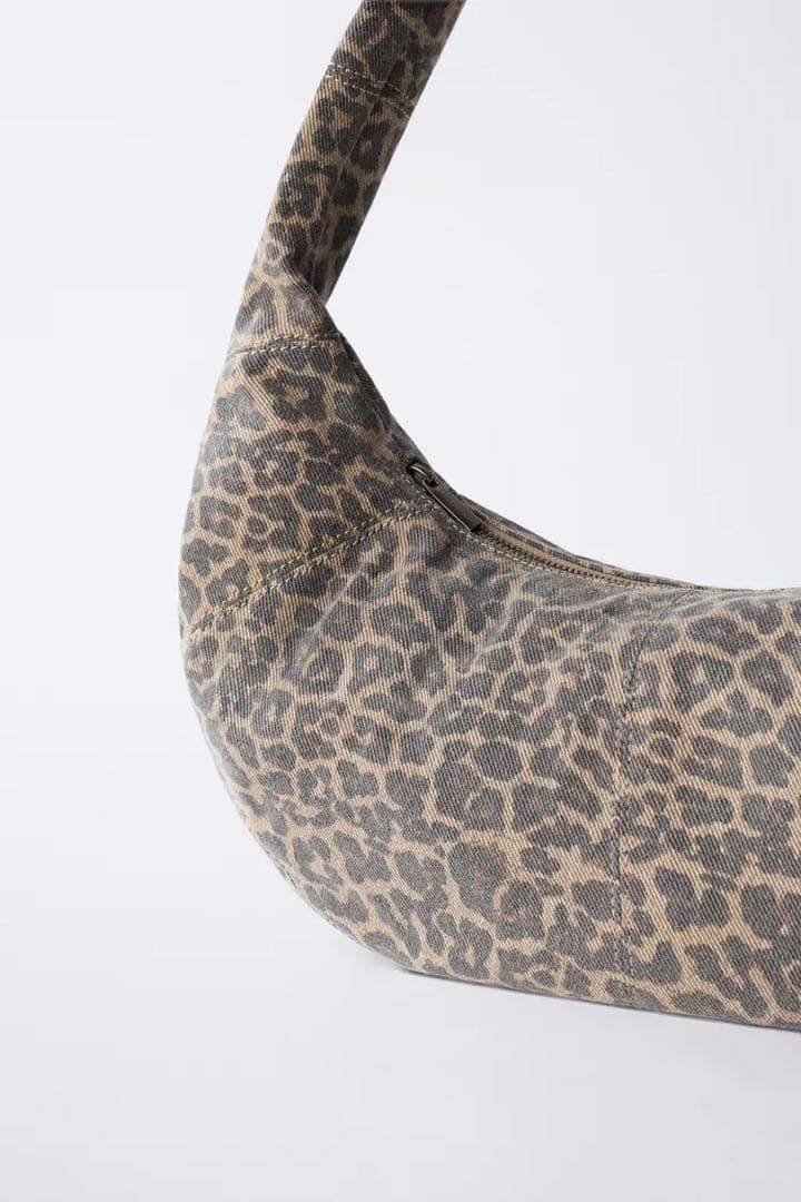 Zara Girls Printed Leopard Bowling Bag (Category: Shoulder Bags) located in Taguig. Submitted by madeasoncloset (Listing ID 1461750346, Image 3). Description: Used on once Very Cute Bag 🤎 Bought 1695.